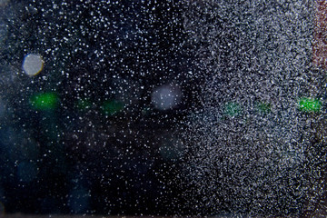 Abstract dust explosion and flash with illumination on a black background