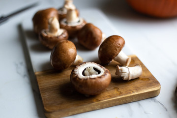 Fresh raw royal champignon on marble board