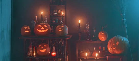 Rolgordijnen Halloween decoration with pumpkins and magic potions indoor © Maya Kruchancova