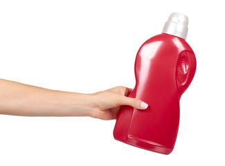 Hand with red detergent bottle, liquid washing soap for textile.