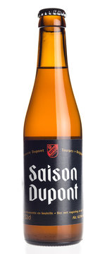 GRONINGEN, NETHERLANDS - DECEMBER 19, 2017: Bottle of Saison Dupont beer isolated on a white background