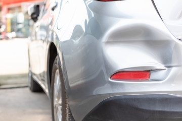 Backside of new silver car get damaged by accident