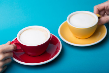 yellow and red cup on a blue background