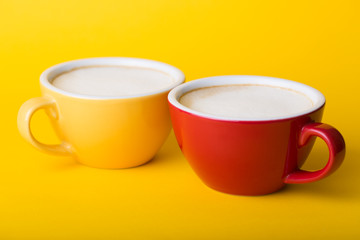 yellow and red cup on a yellow background