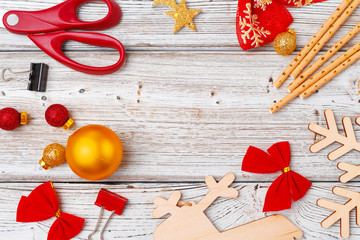 Christmas holiday decorations flatlay on light wooden background