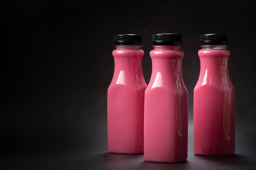 bottles of pink water