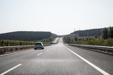 Fototapeta premium Curved country road in autumn
