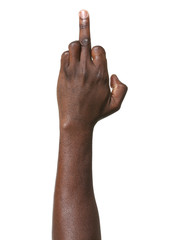 Hand of African-American man showing middle finger on white background