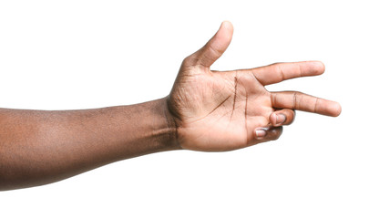 Hand of African-American man on white background