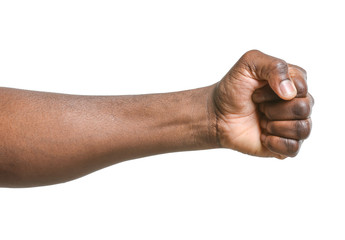Hand of African-American man with clenched fist on white background