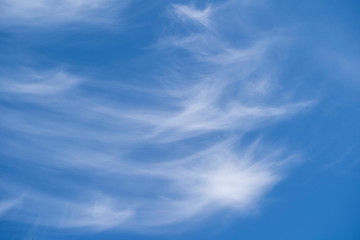 White fluffy clouds in the blue sky