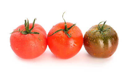 Fresh tomatoes on white background