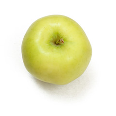 Ripe apple on a white background, top view.