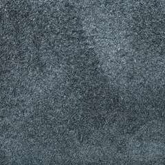 square background from dark gray suede close up