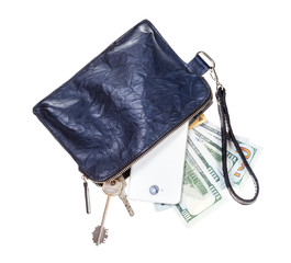 purse with phone, keys, cards and dollars isolated