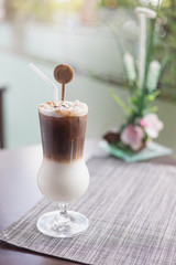Iced coffee long glass In a coffee shop