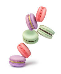 multi-colored macaroons on a white background