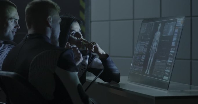 Astronaut analyzing human biology data