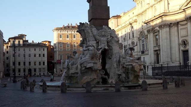 Piazza Navona in early morning - Rome, Italy. Static footage of Fountain of the Four Rivers with St. Agnes Church in Agonein background.