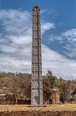 Ancient monolith stone obelisk, symbol of the Aksumite civilization in city Aksum, Ethiopia. UNESCO World Heritage site. African culture and history place. Cradle of life.