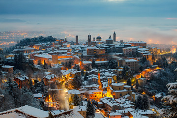 Bergamo aerial view of the snow-covered cityscape, italy europe