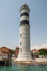 Fototapeta na wymiar Murano Lighthouse - is an active lighthouse located on the island of Murano in the Venetian Lagoon
