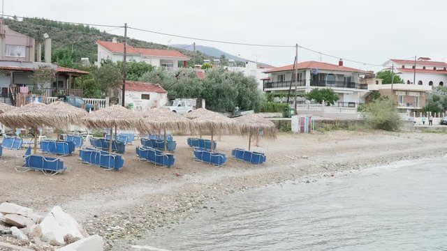 Empty deckchairs on the beach at te end of the summer vaction. End of holiday for tourists.