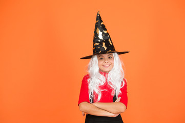 Obraz na płótnie Canvas Magical spell. Small witch with white hair. Wizard or magician. Ghosts have real spirit. Little child witch costume. Halloween party. Small girl in black witch hat. Autumn holiday. Join celebration