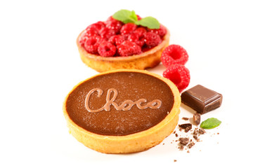 chocolate tart and raspberry tart isolated on white background