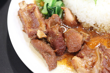 Stewed pork leg with rice and vegetable