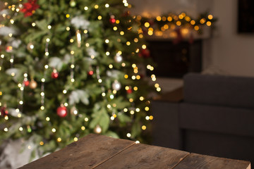 Fototapeta na wymiar Rustic wood table in front of christmas light night