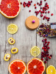 rose, died herbs hips, lemon, grapefruit, cydonia slices, red cranberries, products containing vitamin C , vitamins, antioxidants