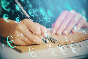 Forex chart displayed on woman's hand taking notes background. Concept of research. Double exposure