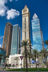DUBAI, UAE - DECEMBER 2016: Exterior view of  modern city buildings in Downtown. Dubai is a major tourist attraction