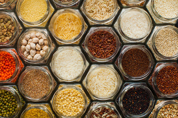 Food pattern background - beans and cereals in jars