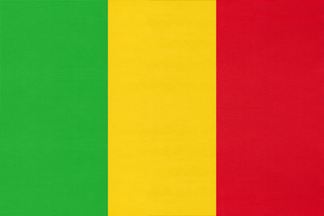 Mali national fabric flag, textile background. Symbol of world african country.