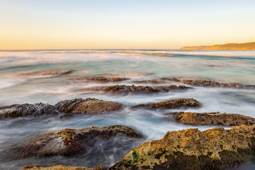 The waves crashing to the shore