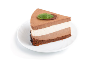 Cake with souffle milk chocolate cream isolated on white  background. side view.