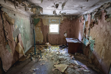 Inside the ruined building of Yaniv railway station near Pripyat city located in Chernobyl...