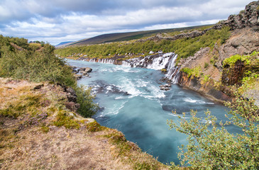 Fototapeta na wymiar Amazing waterfalls of Hraunfossar and Barnafoss, Iceland