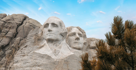 Mount Rushmore National Monument in South Dakota. Summer day with sunset skies.