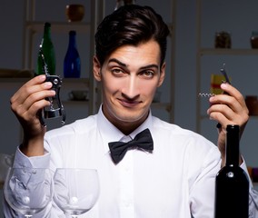 Professional sommelier tasting wine in restaurant