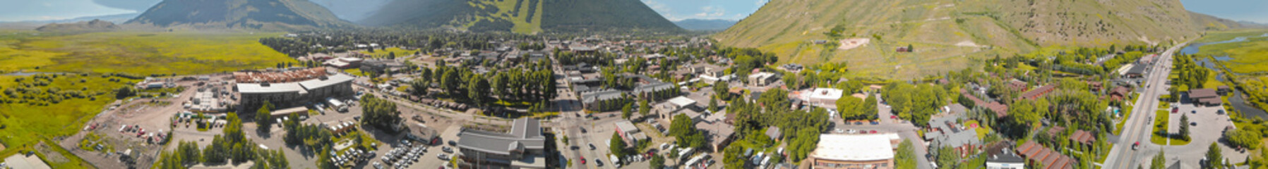 Fototapeta na wymiar Jackson Hole, Wyoming. Panoramic aerial view of town and landscape on a beautiful summer morning.