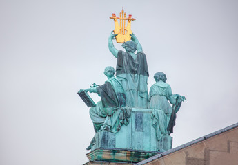 Fototapeta na wymiar Apolon sculpture on top of Opera Garnier in Paris 