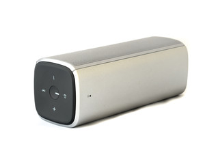Studio shot of grey bluetooth speaker isolated on white