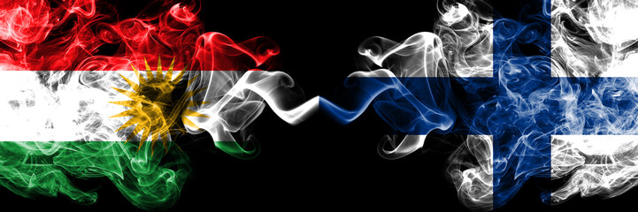 Kurdistan vs Finland, FInnish smoke flags placed side by side. Thick colored silky smoke flags of...