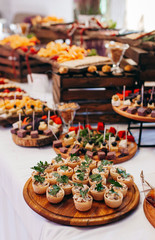 Luxury food and drinks on corporate party table.