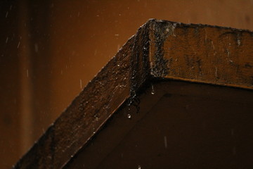 raining in the old dusted wall with some rain drops