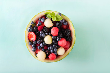 Sliced fruits in watermelon. Fruit salad. Watermelon, berry