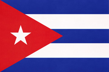 Cuba national fabric flag, textile background. Symbol of international world America caribbean country